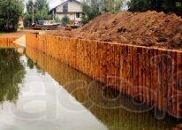 Берегоукрепление бревнами лиственницы